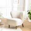 Fauteuil en tissu bouclette écru, dossier capitonné arrondi GASTON
