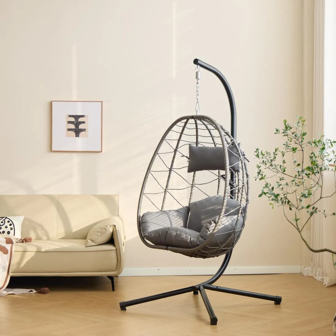 Le fauteuil suspendu VENICE style scandinave en rotin et en métal